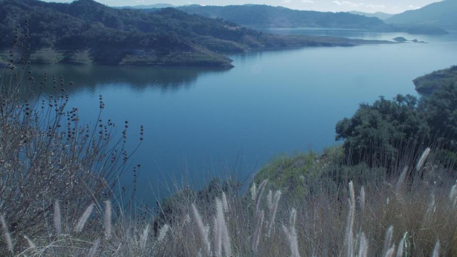 A photo of a river with banks on either side